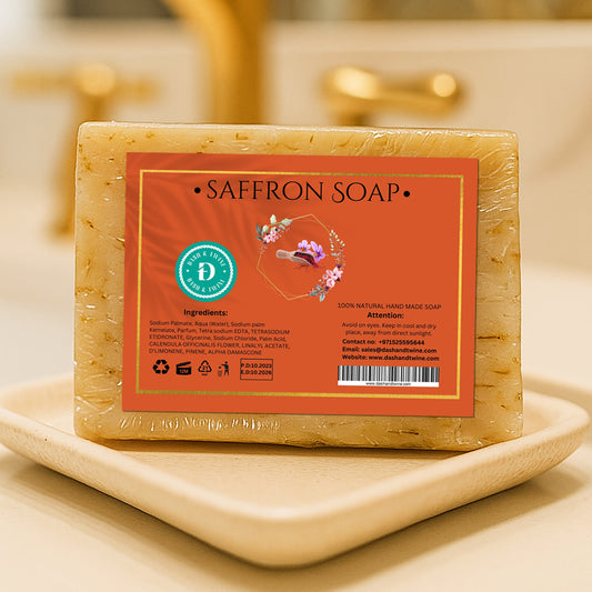 Natural handmade saffron soap bar with visible saffron strands, perfect for brightening and evening skin tone