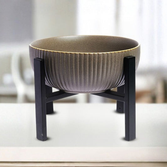 brown ribbed ceramic round bowl with black stand elegant serveware for snacks desserts and stylish dining presentation