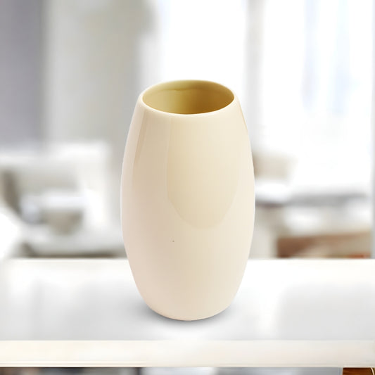 white ceramic cylindrical vase for home decor and modern tabletop styling decorative use only