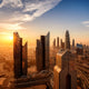 Dubai skyline with sunlight representing UAE climate conditions like heat, dust, and sun exposure affecting home interiors and fine materials