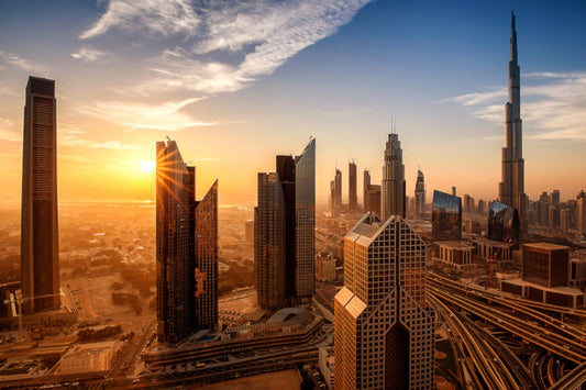 Dubai skyline with sunlight representing UAE climate conditions like heat, dust, and sun exposure affecting home interiors and fine materials