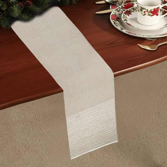 Beige chambray table runner with soft stitched stripe detailing and minimal design

