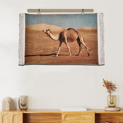 Desert camel tapestry in brown and beige tones with sand dune backdrop, rectangular wall hanging