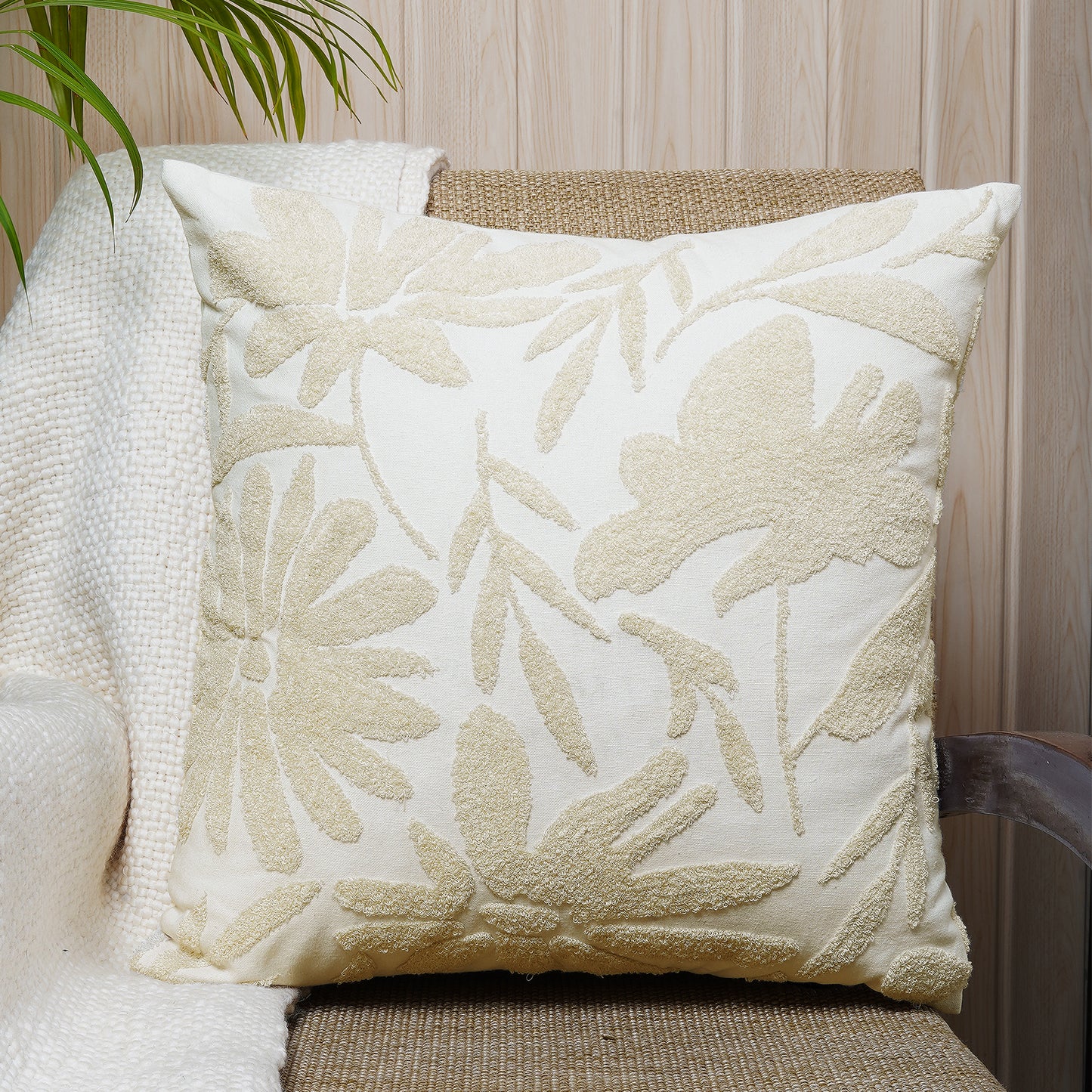Soft ivory square cushion with intricate floral embroidery in warm beige tones - Simply Graceful Collection