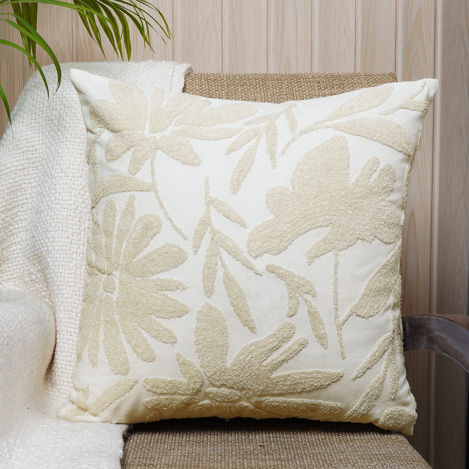 Soft ivory square cushion with intricate floral embroidery in warm beige tones - Simply Graceful Collection