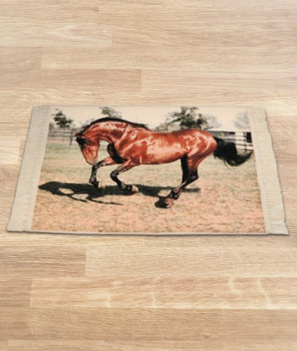Rectangular wall tapestry featuring a galloping brown horse on grassy terrain with beige borders