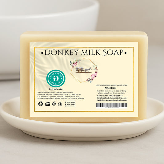 White handmade donkey milk soap bar placed on a light surface, ideal for brightening and anti-aging skincare