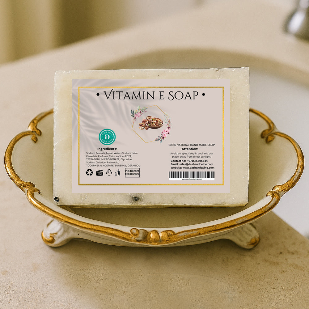 White handmade vitamin E soap bar with visible natural ingredients, ideal for skin repair and deep nourishment