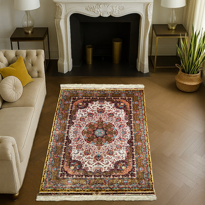 Luxurious silk carpet with intricate Persian floral medallion design in ivory, maroon, and turquoise hues