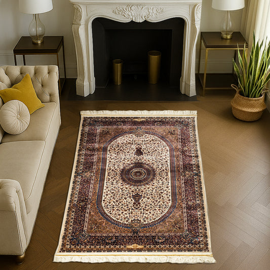 Luxurious Persian-style silk carpet in beige, maroon, and blue tones featuring an ornate medallion and floral pattern
