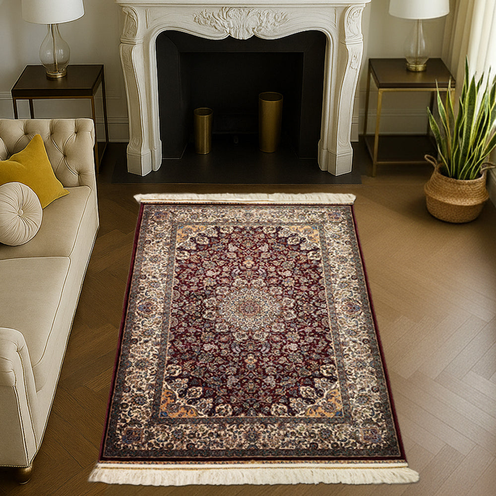 Rich maroon Persian silk carpet with floral detailing and central medallion design by Dash & Twine