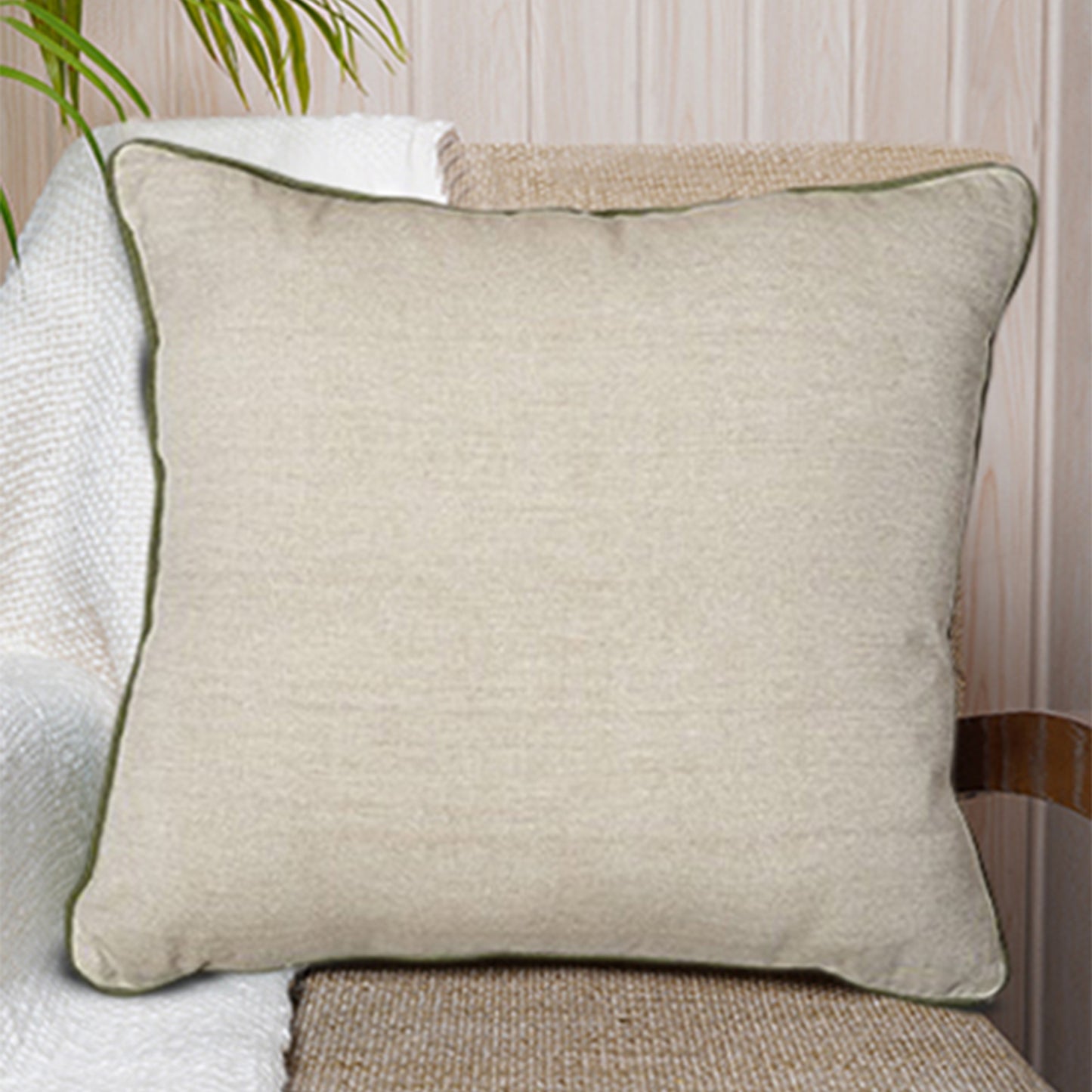 Neutral beige cotton cushion with green piping on the edges - square shape, simple and stylish